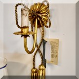 L31. Brass bow sconce.